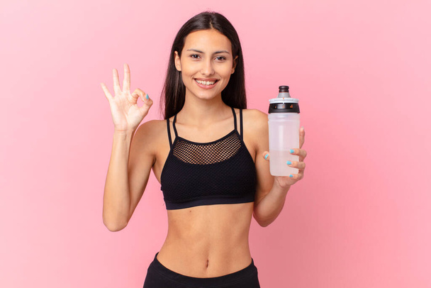 pretty fitness woman with a water bottle - 写真・画像