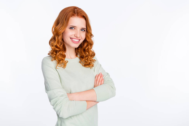 Photo portrait of red haired woman with crossed hands smiling isolated white color background with empty space - Foto, Bild