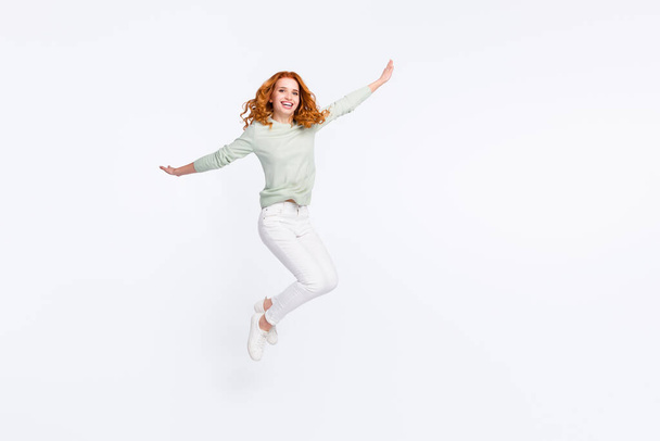 Full length body size photo young woman red hair jumping up playful careless childish isolated white color background - Foto, Imagem