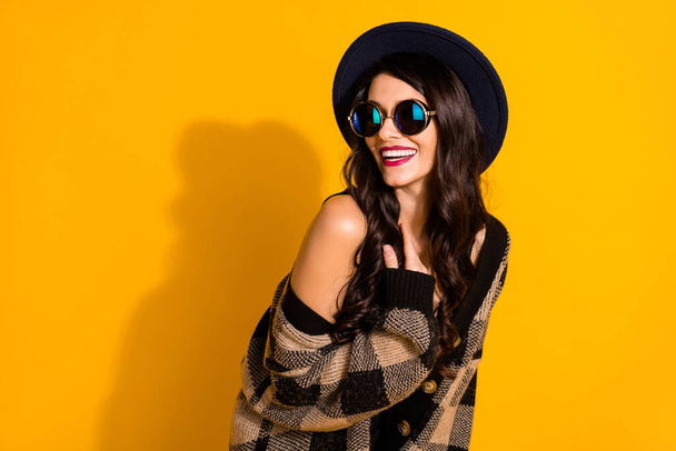 Photo of happy cute gorgeous woman look dreamy empty space wear sunglass isolated on yellow color background - Φωτογραφία, εικόνα