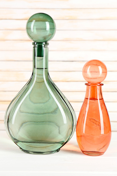 Decorative bottles on wooden background - Foto, Imagem