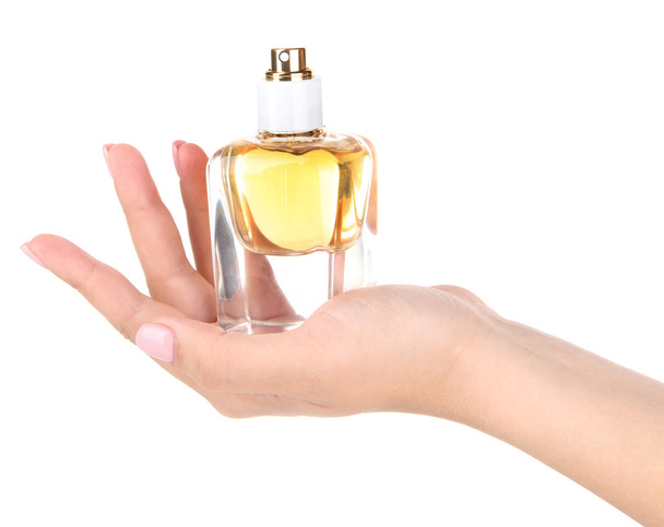 Flasche Parfüm in der Hand isoliert auf weiß - Foto, Bild
