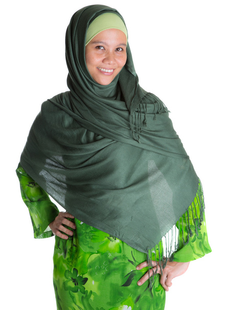 Mulher muçulmana vestido verde
 - Foto, Imagem