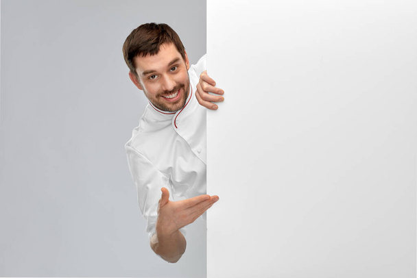 happy smiling male chef with big white board - Fotoğraf, Görsel
