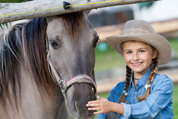 Ranch - Lovely girl with horse on the ranch - Photo, Image