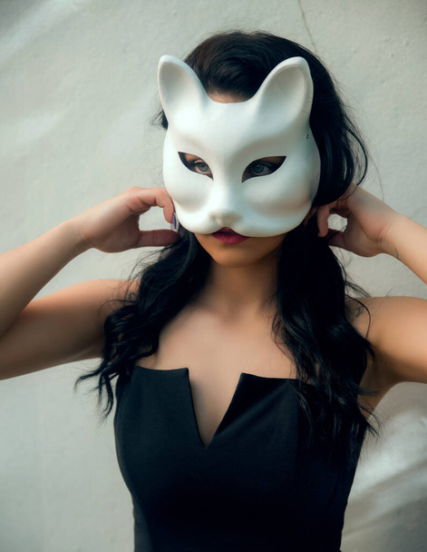 beautiful young girl with white hair and mask  - 写真・画像