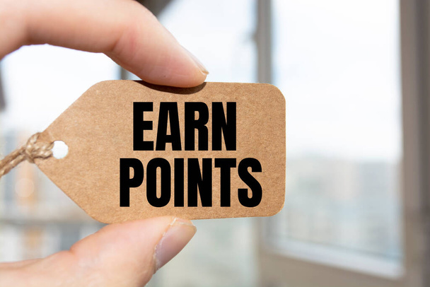 Word, writing, text Earn Points. Conceptual photo Loyalty Reward Benefit Program For Earning Customer Point written Sticky Note Paper Holding Hand with Finger. - Photo, Image