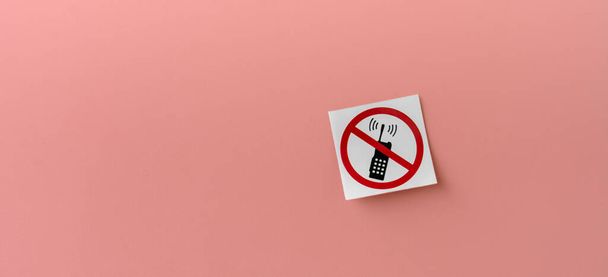 a phone banned forbidden sign symbol sticker on the wall isolated - Фото, изображение