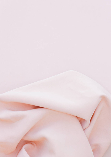 Beige silk fabric background. Stylish aesthetic minimal wallpaper - Foto, imagen