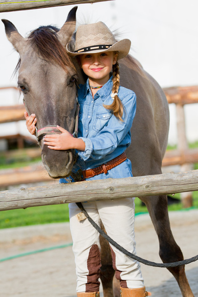 Ranch - Lovely girl with horse on the ranch - Fotoğraf, Görsel