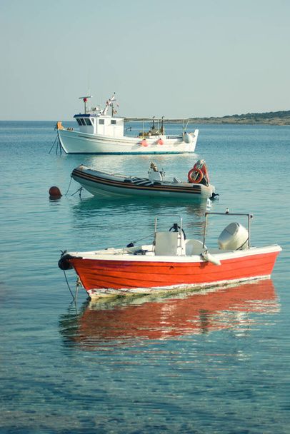 Antiparos island Greece Small boats in a placid bay Calm, beautiful scene  No people Copy space - 写真・画像
