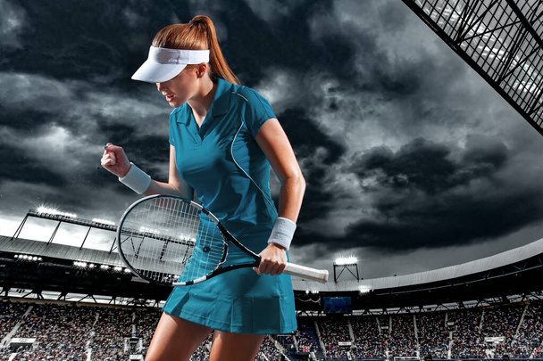 Tennis player with racket. Woman athlete celebrating victory on grand arena background after good play. - Valokuva, kuva