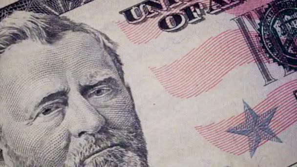 Een paar vijftig dollar biljetten bevestigd close-up Ulysses S Grant motie - Video