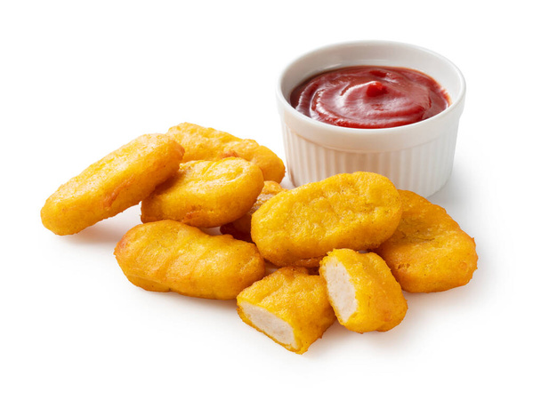 Chicken nuggets and tomato ketchup on a white background. - Photo, Image