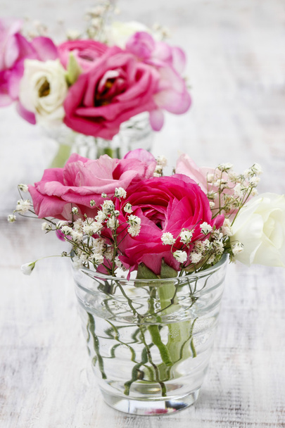 Tiny bouquets in glass vases. Wedding floral decorations - Φωτογραφία, εικόνα