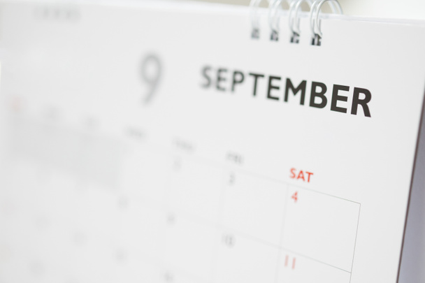 Página del calendario de septiembre con meses y fechas concepto de reunión de planificación de negocios - Foto, imagen