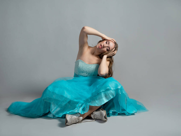 beautiful and daring princess in a lush blue Cinderella dress - Foto, immagini
