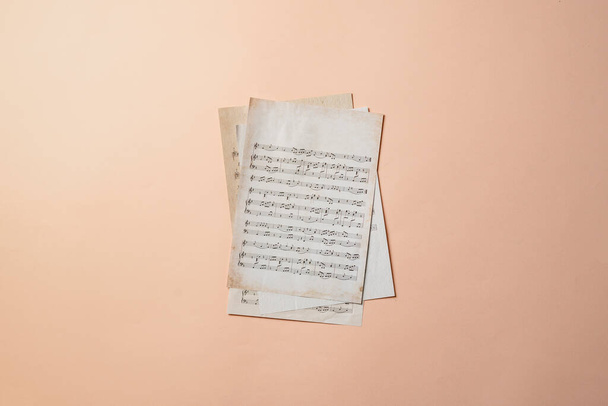 a close up ancient old paper sheet with music notes, classic culture arts - Photo, Image