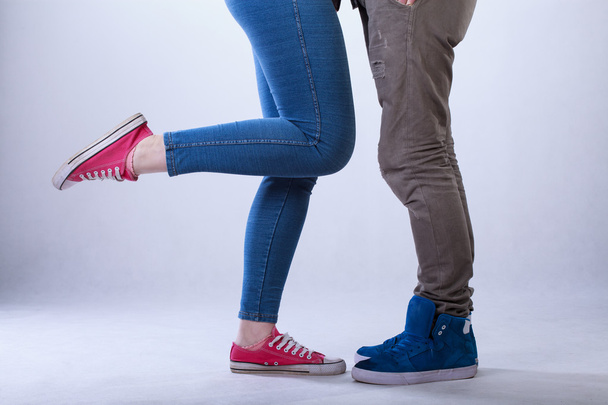 Close-up of teenage couple legs - Фото, изображение