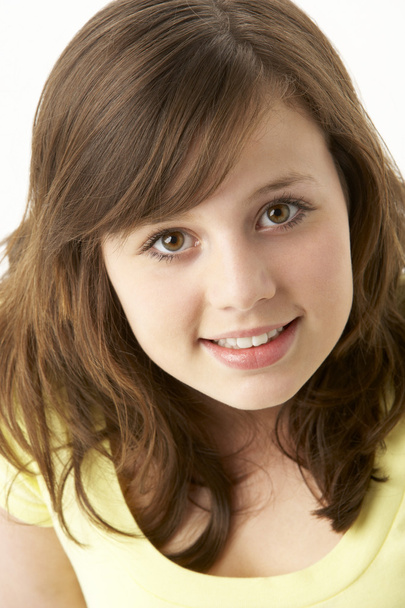 Portrait Of Smiling Young Girl - Foto, afbeelding