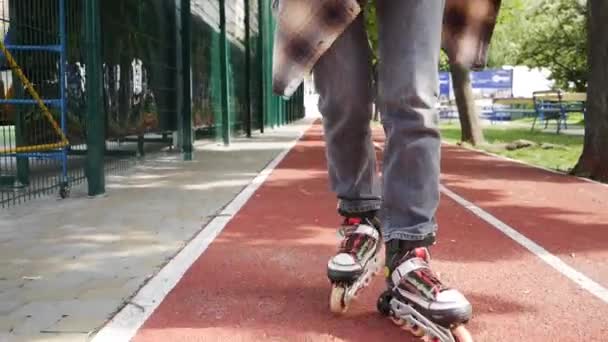 Cute Teenage Girl Wearing Roller Skaters In Summe Park. Blonde girl roller skating. - Footage, Video