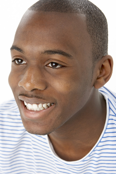 Studio Portrait Of Smiling Teenage Boy - Foto, Bild
