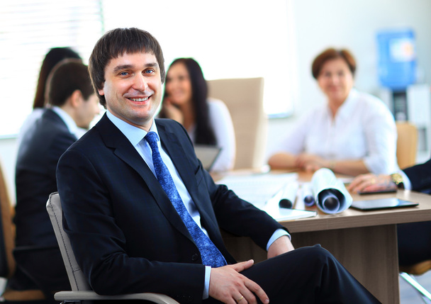 Portrait of smiling businessman working in office, looking camera - Photo, Image