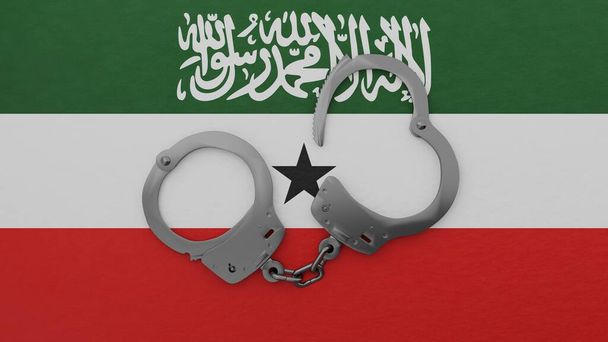 Puolet avattu teräs käsiraudat keskellä ja päälle Somalimaan lippu - Valokuva, kuva