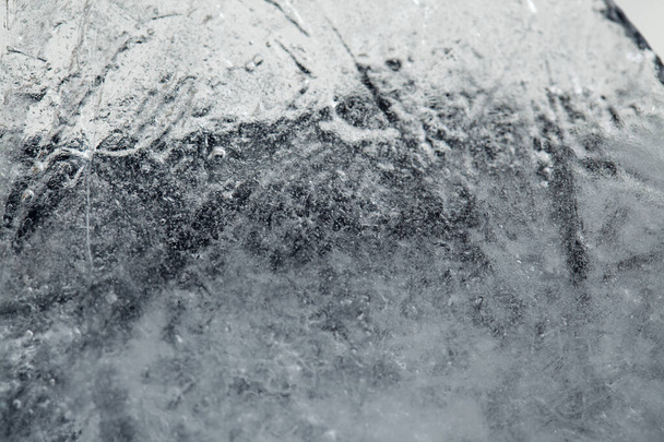Ice texture with small round air bubbles trapped inside  - Valokuva, kuva