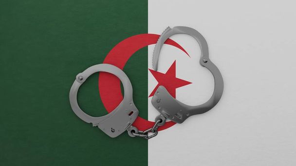 Esposas de acero medio abiertas en el centro y encima de la bandera nacional de Argelia - Foto, Imagen
