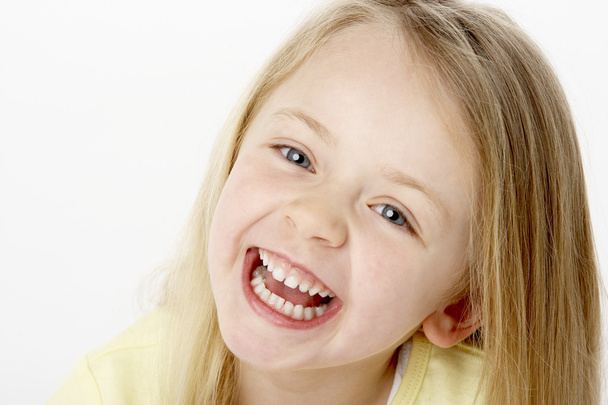 Portrait Of Smiling Young Girl - Fotografie, Obrázek