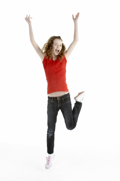 Young Girl Jumping In Air - Фото, изображение