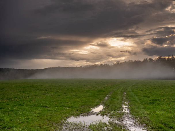 Storm clouds over a field - Photo, Image