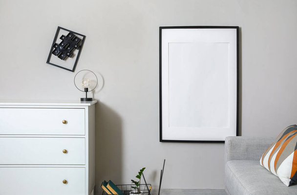 Interior of modern stylish room with blank photo frame - Φωτογραφία, εικόνα