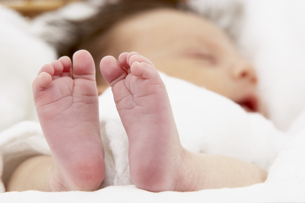Detail Of Sleeping Baby's Feet - 写真・画像