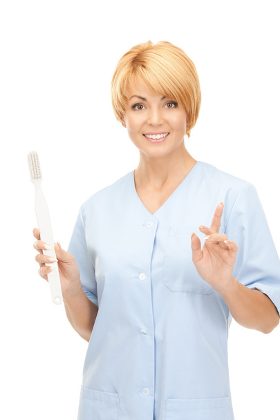 Doctor with toothbrush - Photo, image
