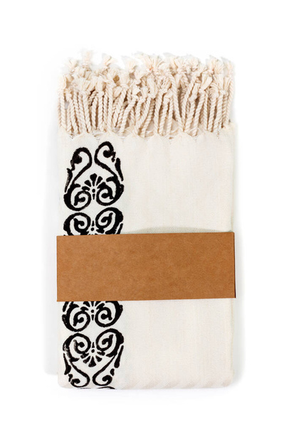 Peštemální turecký ručník složený barevným textilem pro lázně, pláž, bazén, lehké cestování, zdravou módu a dárky. Tradiční turecké lázně materiál, ruční práce, béžový a kamenný vzhled - Fotografie, Obrázek