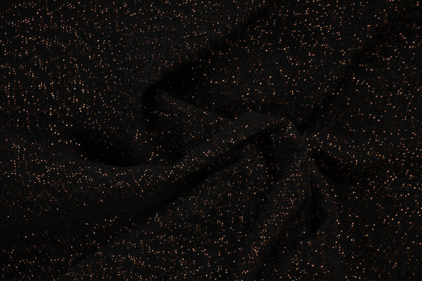 czarny pognieciony materiał z błyszczącymi bryzgami, makro zdjęcie na tło - Zdjęcie, obraz