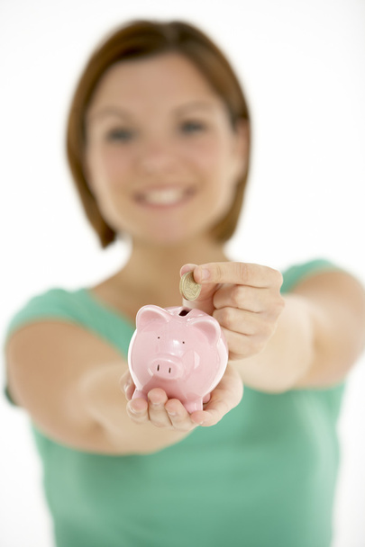 Woman Holding Piggy Bank - Foto, imagen