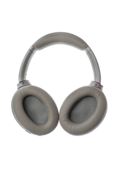 um novo fones de ouvido sem fio cinza moderno, dispositivo de estúdio de áudio isolado - Foto, Imagem