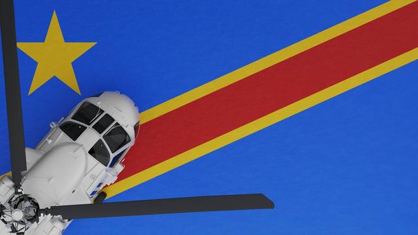 Top down view of a White Helicopter in the Bottom Left Corner and on top of the National Flag of Congo Democratic Republic of the - Photo, Image