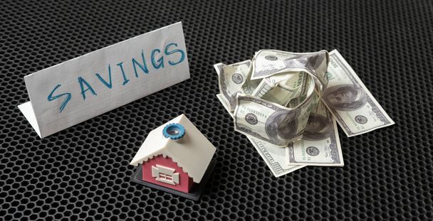 грошові заощадження для нового будинку, проста міні концепція
 - Фото, зображення