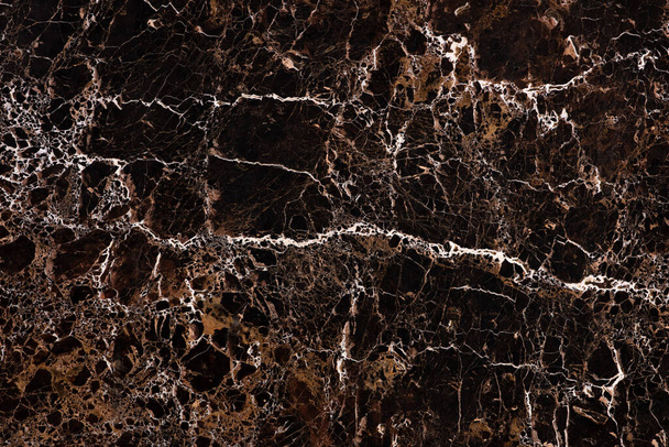 Awesome Imperador Gold - marble background, elegant texture in dark color for creative design work. - Photo, Image