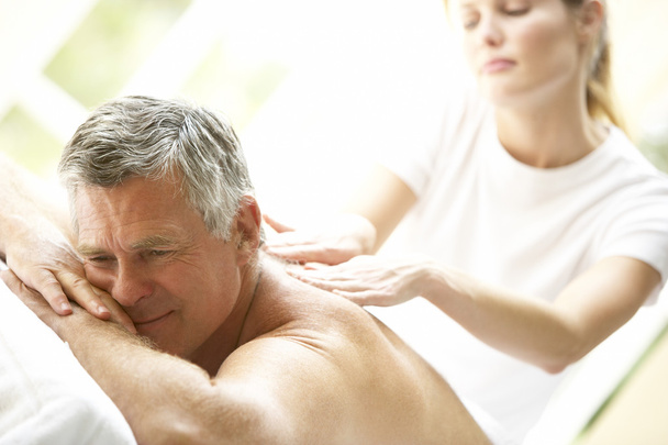 Middle Aged Man Enjoying Massage - Foto, imagen