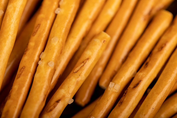 Breadsticks with salt surface texture. Close-up Selective focus - Valokuva, kuva