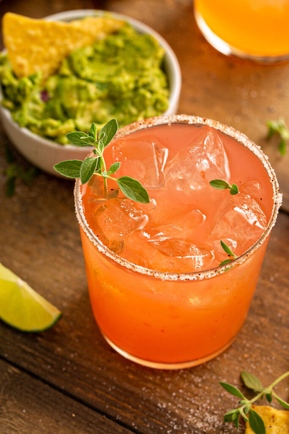 Spicy grapefruit margarita with chips and guacamole - Fotografie, Obrázek