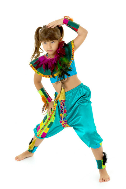 Lovely girl posing in festive costume - Foto, imagen