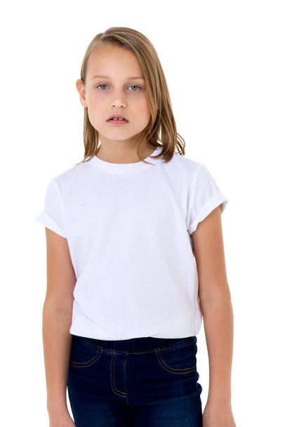 Blonde in a white T-shirt in the studio on a white background. Close-up - Foto, Imagem