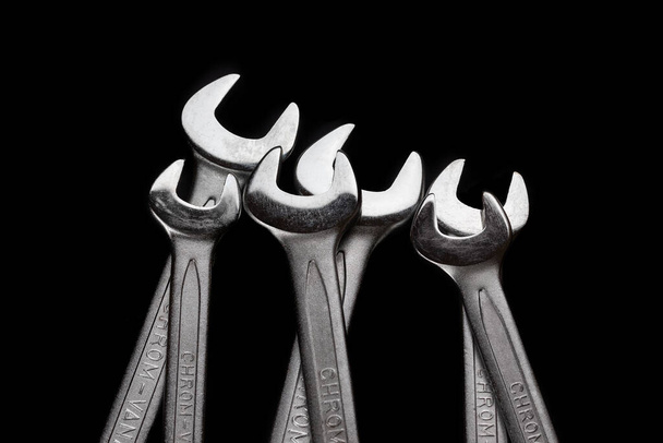 Wrenches isolated on black background closeup - Photo, Image