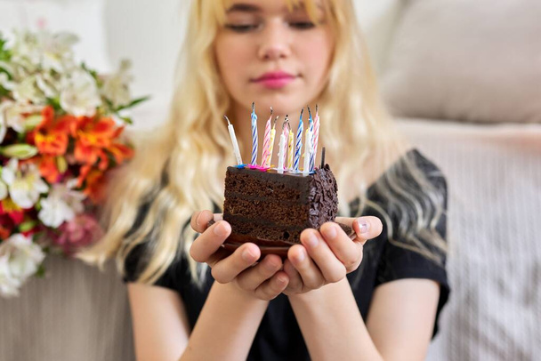 Birthday of female teenager, girl with cake and festive candles - Foto, immagini